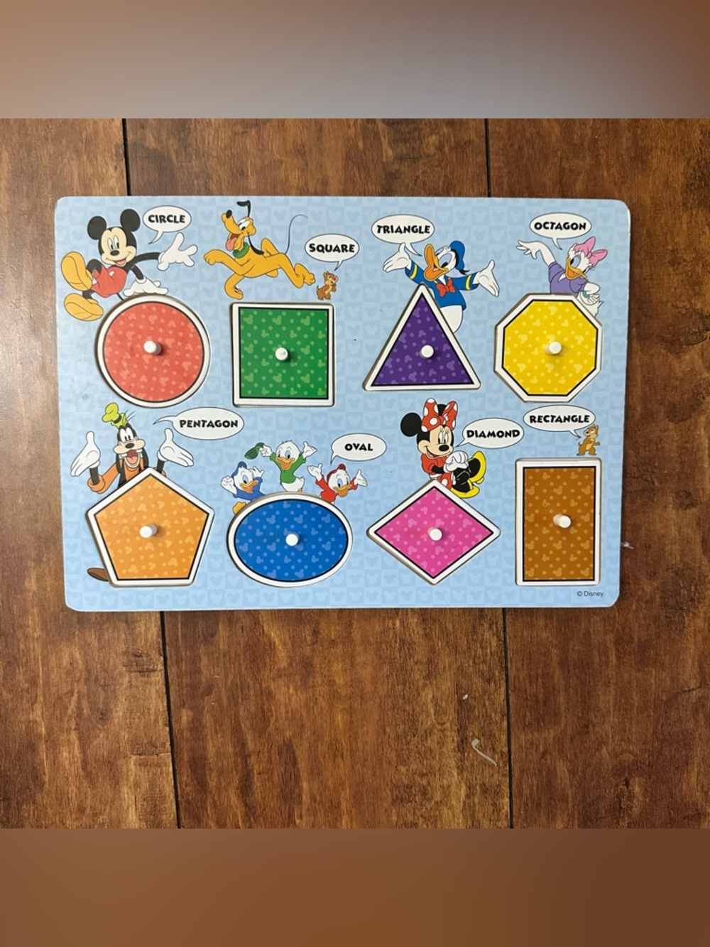 Mickey Mouse Clubhouse Wooden Shapes & Colors Peg Puzzle by Melissa & Doug.